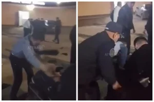 Бір топ жігіт полиция қызметкерлерін соққыға жықты